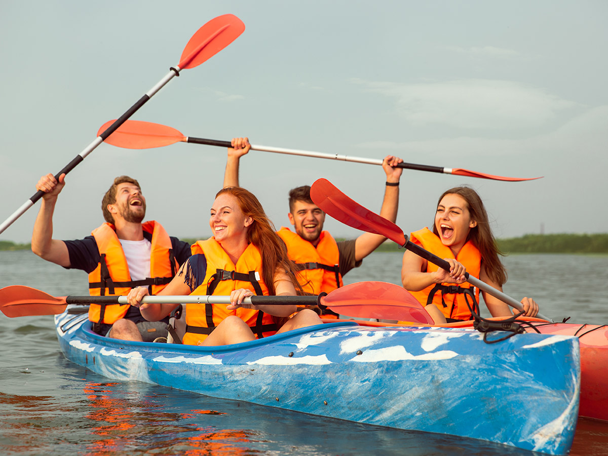 A group of having fun canoeing